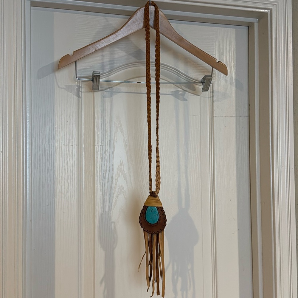 Costume Jewelry with leather fringe.
